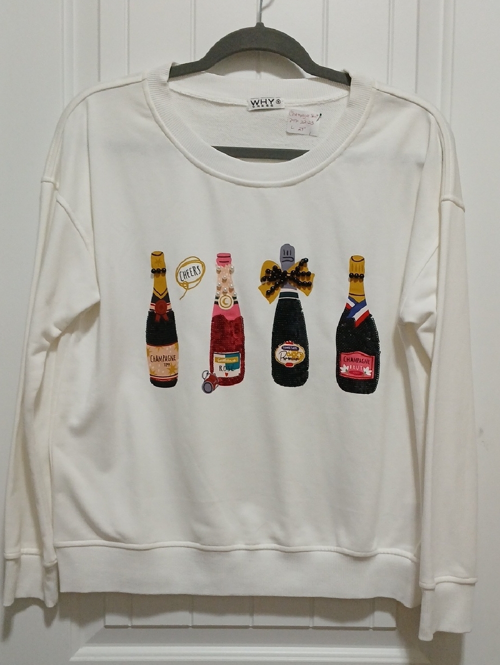 White Sweatshirt with Embroidered Champagne Bottles
